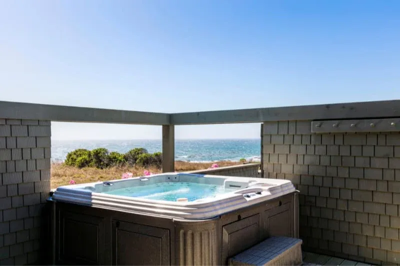 Well-maintained outdoor hot tub with balanced water chemistry and clear alkalinity levels