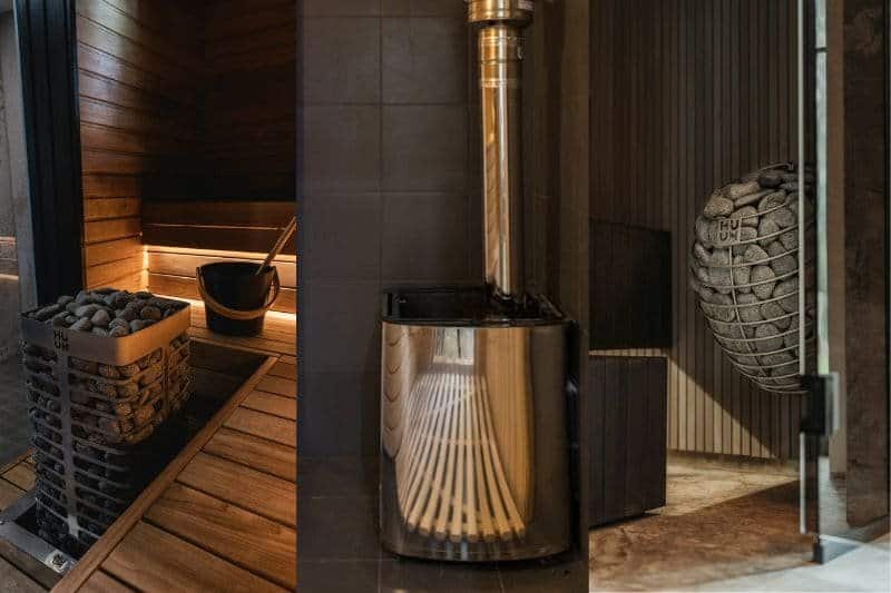 Three sauna heaters in different settings: one with a pile of stones in a wooden basket, another with a reflective metal exterior, and the third mounted on a wall, each reflecting best sauna heater designs for 2024.