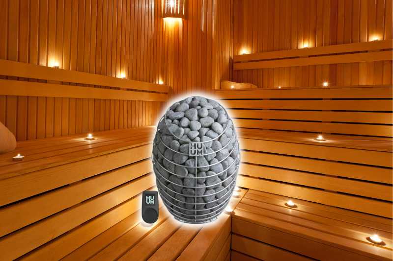 HUUM Drop 6 sauna heater in a well-lit sauna, highlighting the sleek design and effective heating performance.