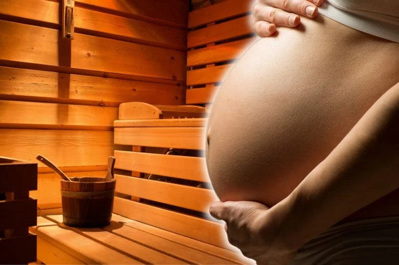 Close-up of a pregnant woman's belly with a sauna in the background, illustrating the topic of sauna and pregnancy safety and considerations.