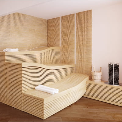 Modern sauna with tiered, curved wooden benches and sleek wall paneling