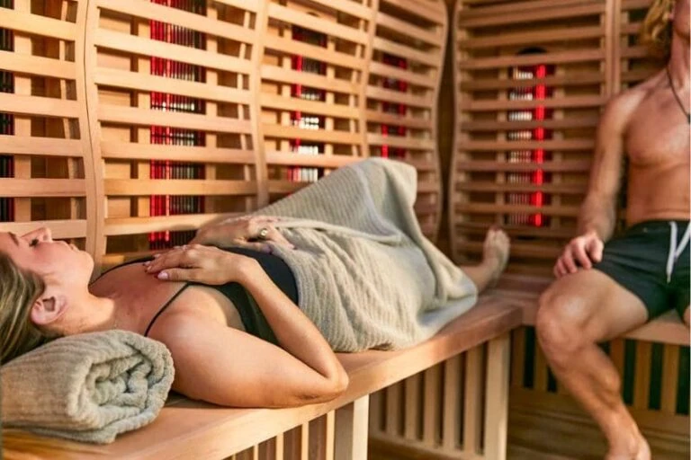 Couple enjoying the health benefits of an infrared sauna session