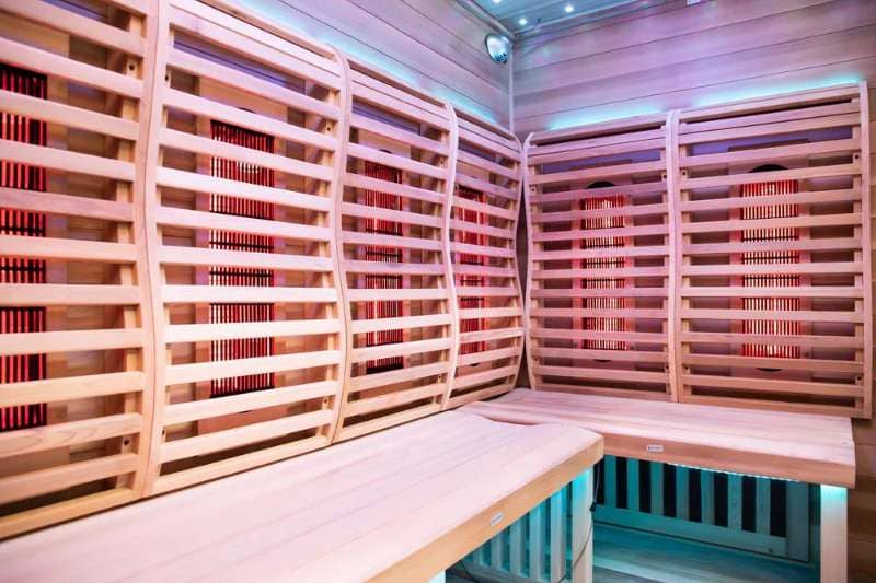 Infrared sauna with heater panels and wooden interior design