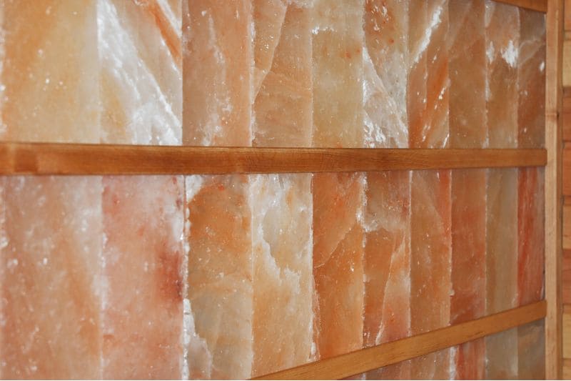 Salt wall panels in sauna interior, providing therapeutic benefits and natural ambiance