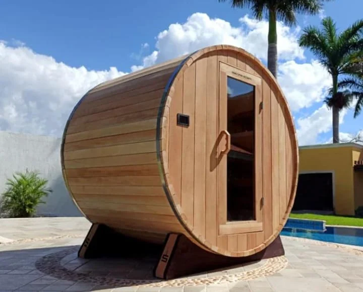 Stylish 2-person outdoor barrel sauna with glass door, ideal for backyard relaxation