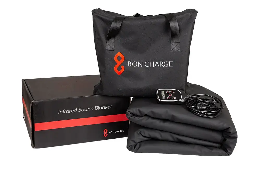 BON CHARGE Infrared Sauna Blanket complete set including carrying bag, controller and folded blanket on white background