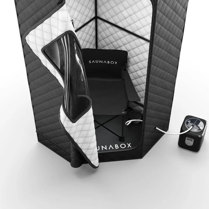 Inside view of Saunabox portable sauna showing foldable chair and quilted insulation panels