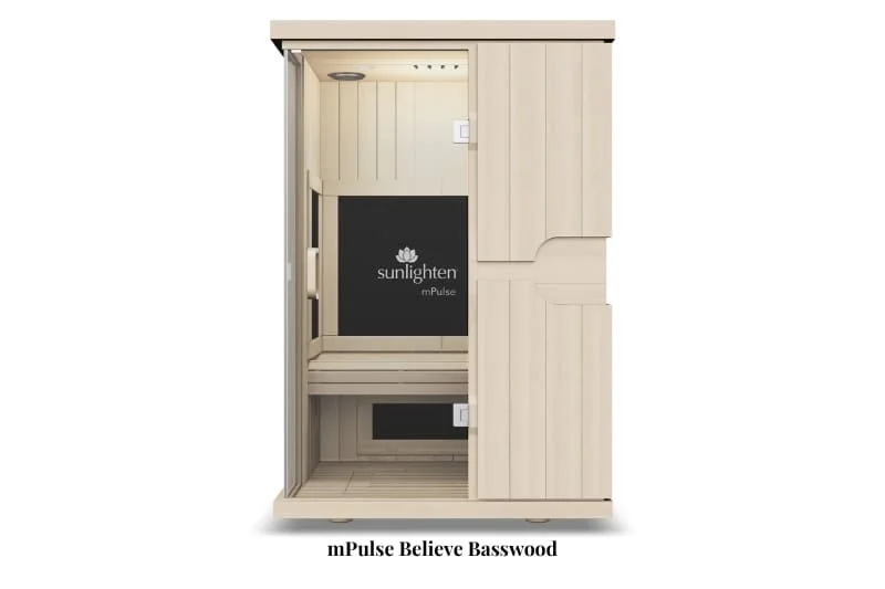 Sunlighten mPulse Believe infrared sauna in light basswood finish featuring glass door, black digital control panel, and ergonomic bench seating in a sleek, modern design.