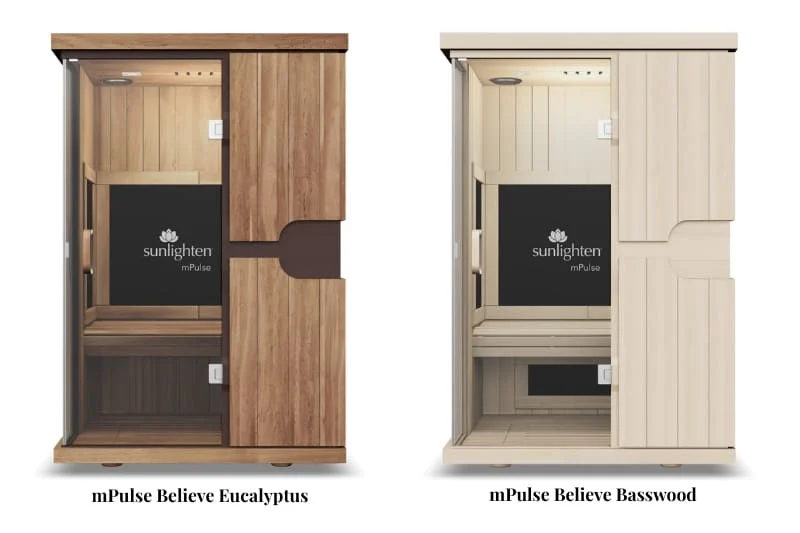 Comparison of Sunlighten mPulse Believe infrared saunas in two wood options - rich eucalyptus wood (left) and light basswood (right), both featuring identical layouts with digital control panels.