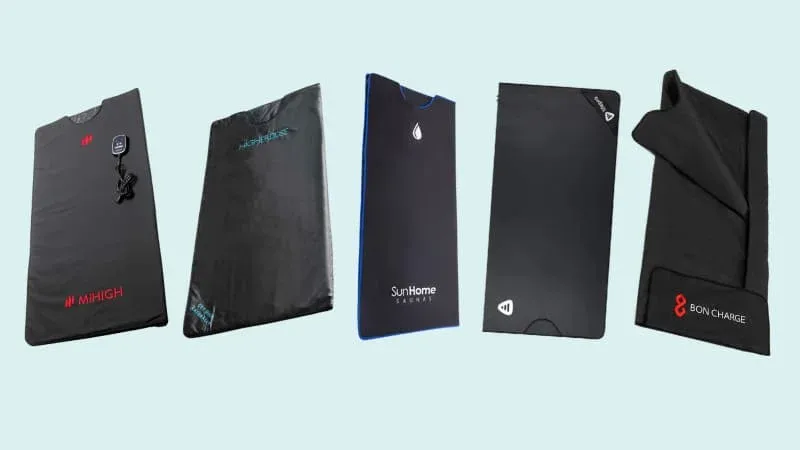 Comparison of five popular infrared sauna blankets showing MiHIGH, HigherDOSE, Sun Home, LifePro RejuvaWrap, and BON CHARGE models side by side