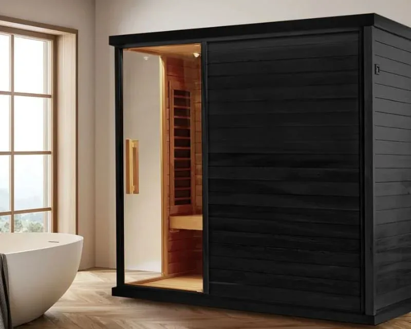 Sun Home Solstice 4-person infrared sauna with black exterior and eucalyptus interior in modern bathroom setting