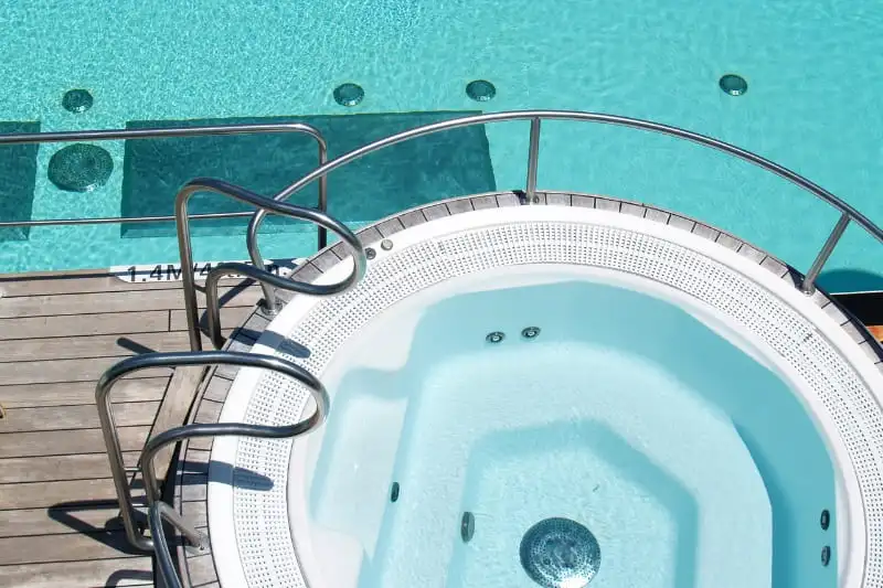 Clear hot tub water with proper alkalinity levels showing crystal clear water and functioning jets